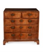 A George II walnut, crossbanded and pine chest of drawers