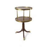 A Regency mahogany and gilt brass mounted two tier dumb-waiter