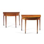 A pair of George III figured mahogany and crossbanded card tables