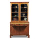 A George I walnut secretaire cabinet bookcase