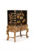A black lacquer and gilt japanned cabinet on stand
