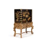 A black lacquer and gilt japanned cabinet on stand