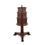 A George IV mahogany revolving bookcase