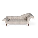 A Victorian walnut and upholstered chaise longue