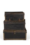 Three Chinese Export leather, studded and brass bound trunks