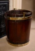 A large George III mahogany and brass bound plate bucket
