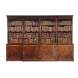 A George III mahogany breakfront library bookcase