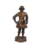 A Venetian carved wood, polychrome painted and parcel gilt figure of a Blackamoor