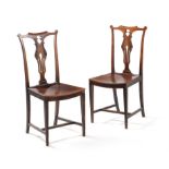 A pair of unusual George III fruitwood side chairs