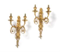 A pair of fine gilt bronze wall appliques to a design by Jean Hauré