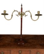 A George III mahogany and brass mounted height adjustable twin light candelabrum