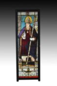 An impressive life-size French stained and leaded glass window panel depicting Saint Martin