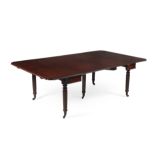 A Regency mahogany concertina action extending dining table