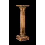 An impressive French gilt bronze mounted columnar pedestal