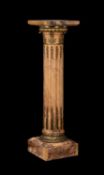 An impressive French gilt bronze mounted columnar pedestal