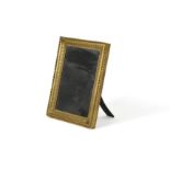 A Napoleon III gilt bronze dressing table mirror