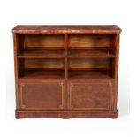 A French figured mahogany and gilt metal mounted open bookcase