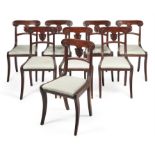 A set of eight George IV mahogany dining chairs