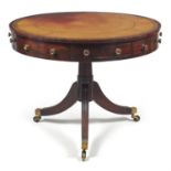 A Regency mahogany 'drum' library table