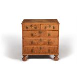 A William & Mary walnut and parquetry chest of drawers