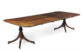 A Regency mahogany twin pedestal dining table