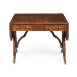 Y A Regency rosewood, inlaid and brass mounted sofa table