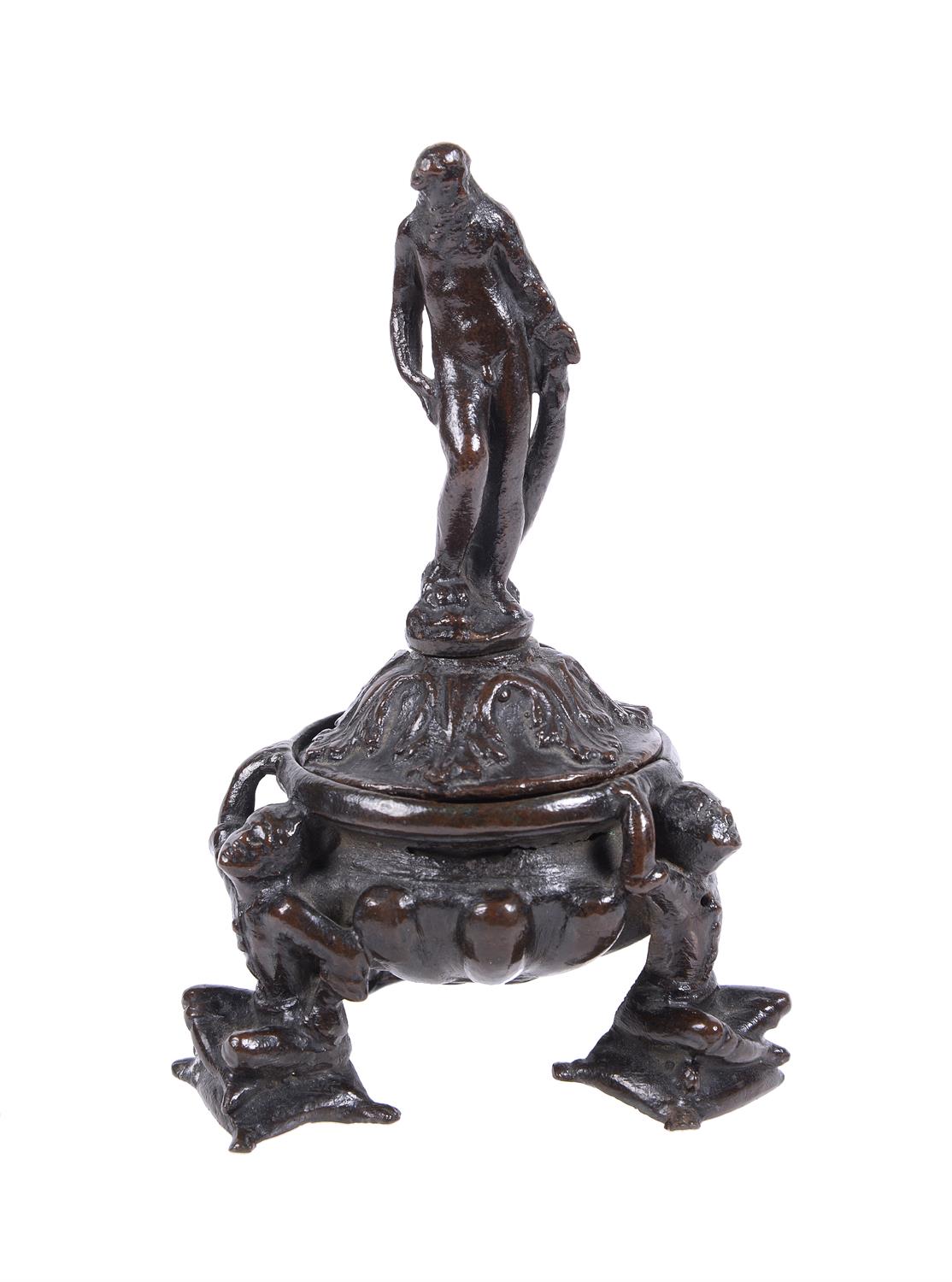 A Venetian patinated bronze inkwell and cover, early 17th century