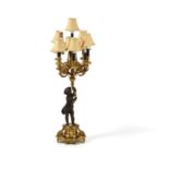 A large French patinated and gilt bronze nine light figural candelabrum