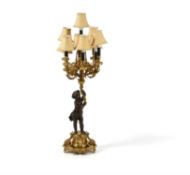 A large French patinated and gilt bronze nine light figural candelabrum