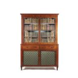 A Regency mahogany and brass mounted cabinet bookcase