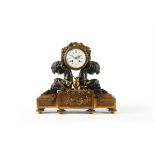 A French Napoleon III ormolu and patinated bronze figural mantel clock