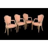 A set of four George III cream and polychrome painted painted open armchairs