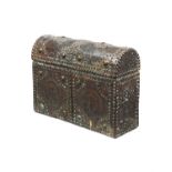 A tooled leather and brass studded trunk