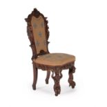 A Continental carved walnut and upholstered side chair