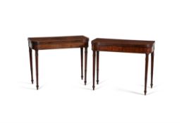 A pair of Regency 'plum pudding' mahogany tea tables