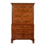 A George II walnut and crossbanded chest on chest