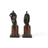 A pair of Italian patinated bronze Grand Tour souvenir models of Hercules and Flora Farnese