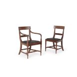 A set of fourteen George IV mahogany dining chairs