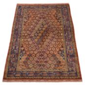 A Turkoman silk carpet