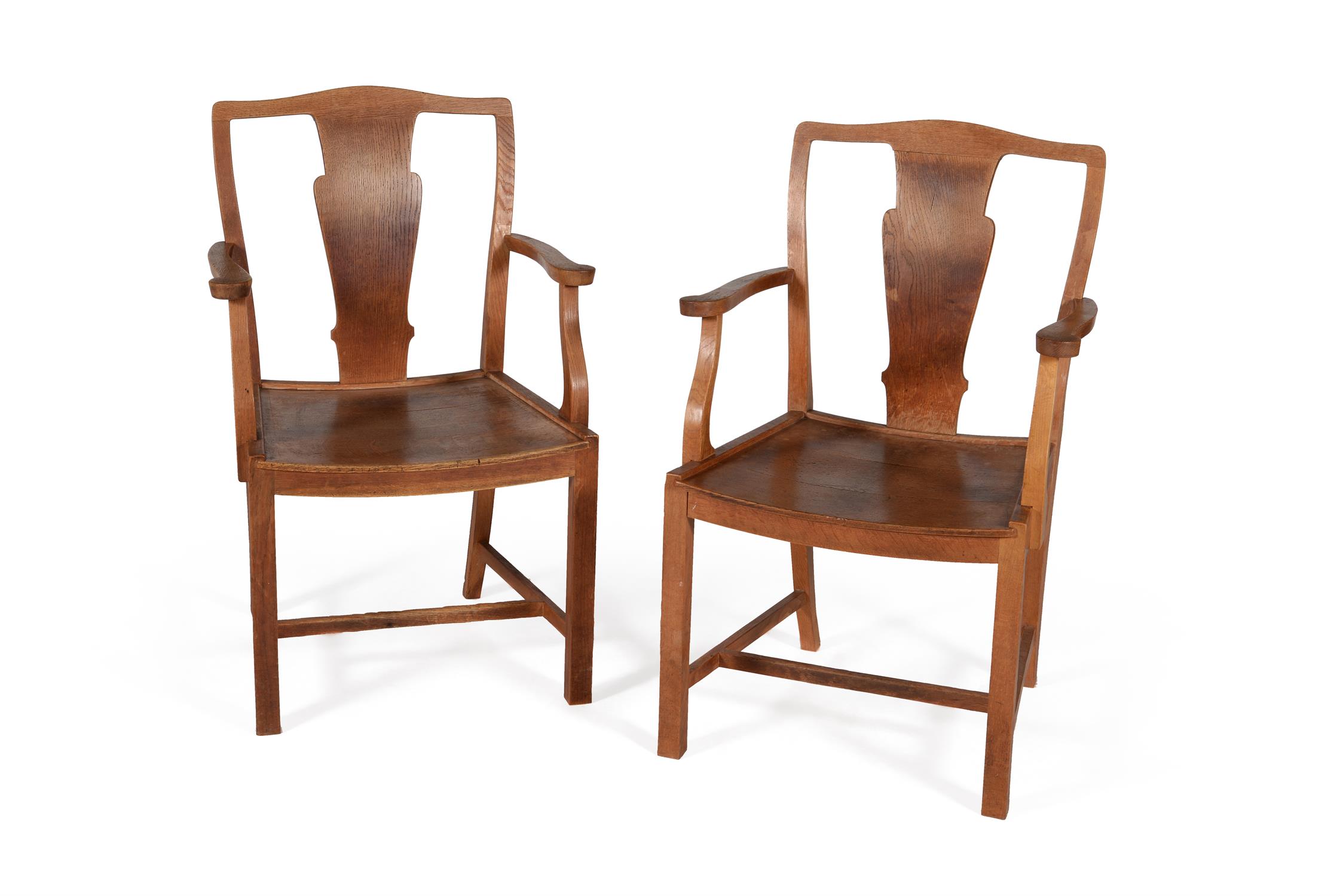 A pair of oak open armchairs, , by Heal's