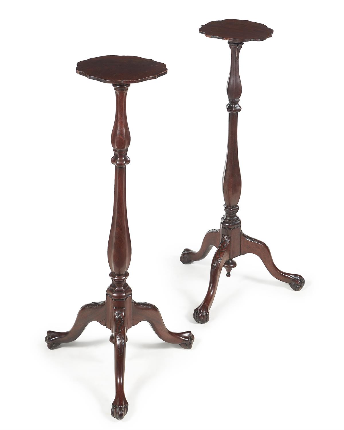 A pair of George II mahogany torchère stands