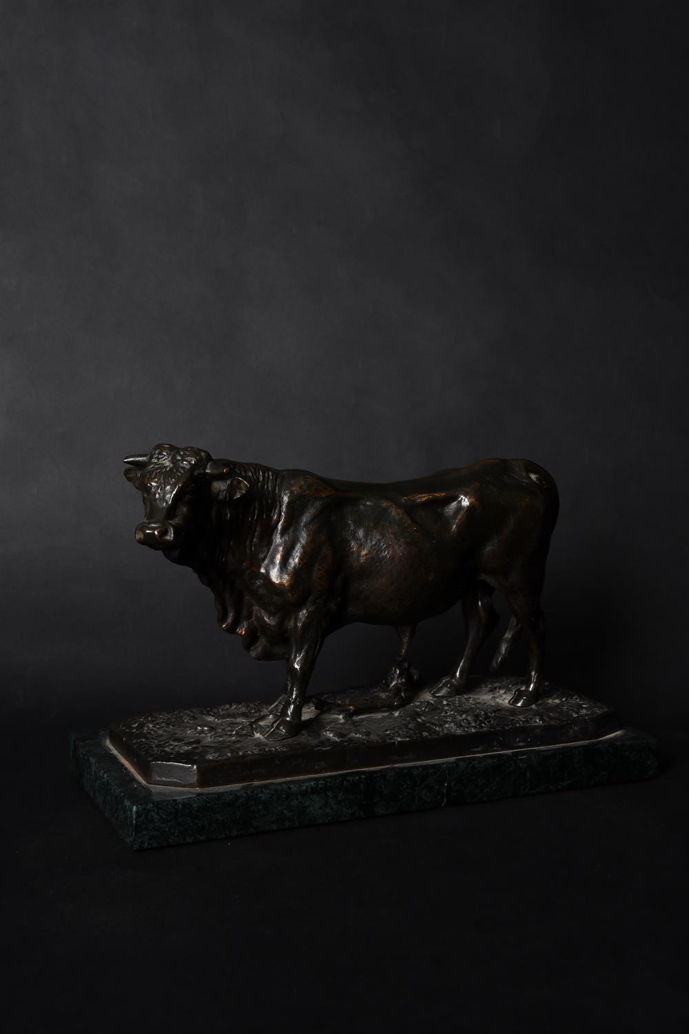 After Pierre-Jules Mene (1878-1961), a patinated bronze model of a standing bull