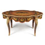 A French kingwood, ebonised, marquetry and gilt metal mounted centre table, by Bassie & Co