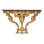 A carved giltwood serpentine console table