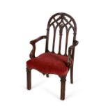 A Gothic Revival beech open armchair