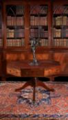 A Regency octagonal library drum table