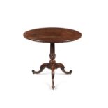 A George III mahogany tripod table