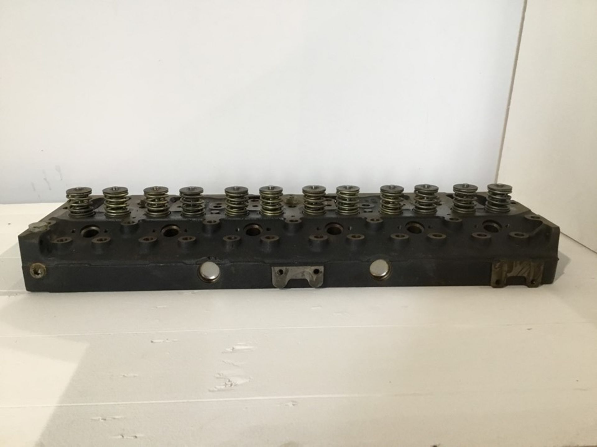 Stillage containing 6 Perkins cylinders heads cast no3711603A and qty 4 Perkins cylinder cast no - Image 10 of 36