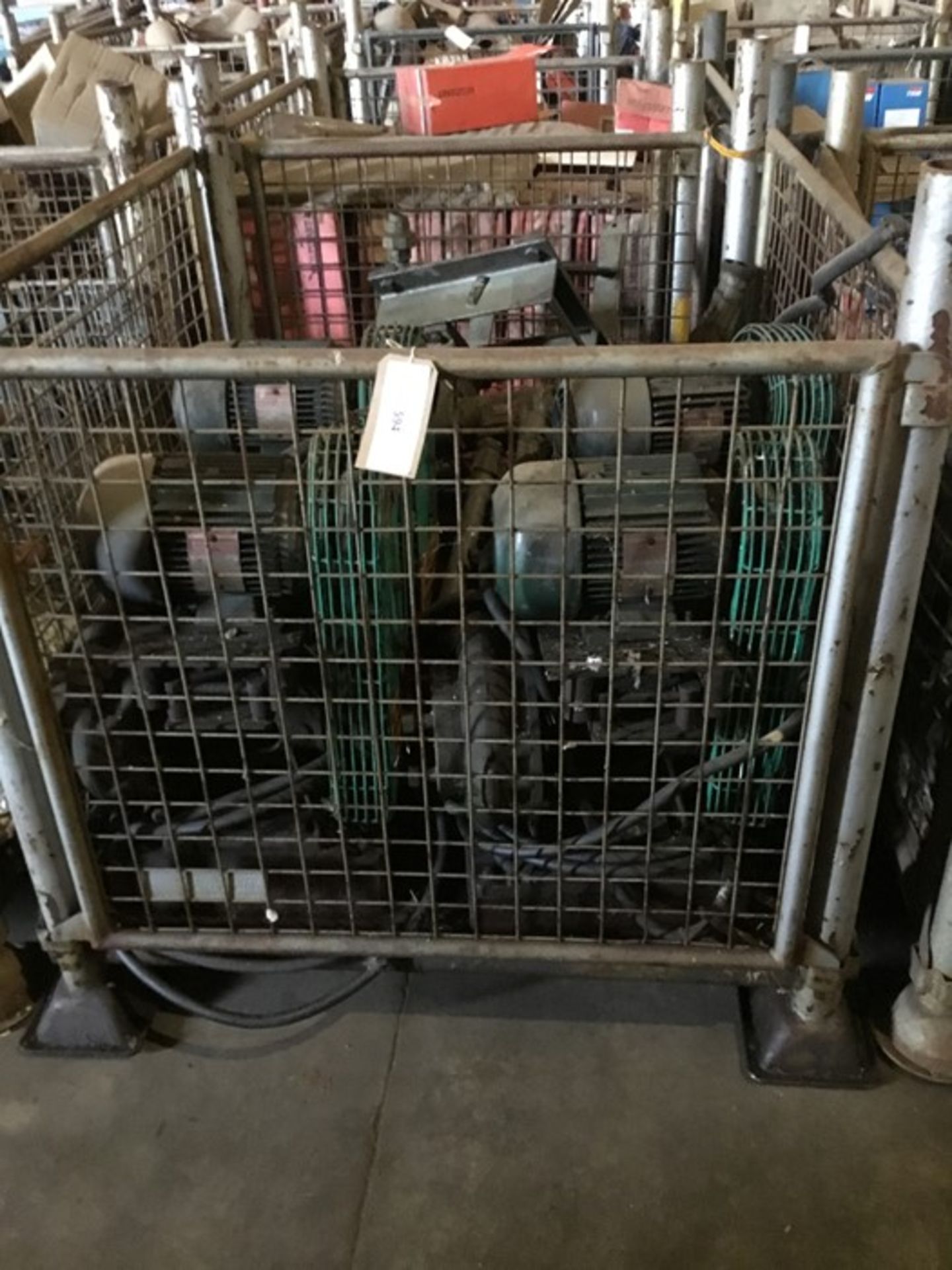Cage containing 4 pumps with electric motors etc