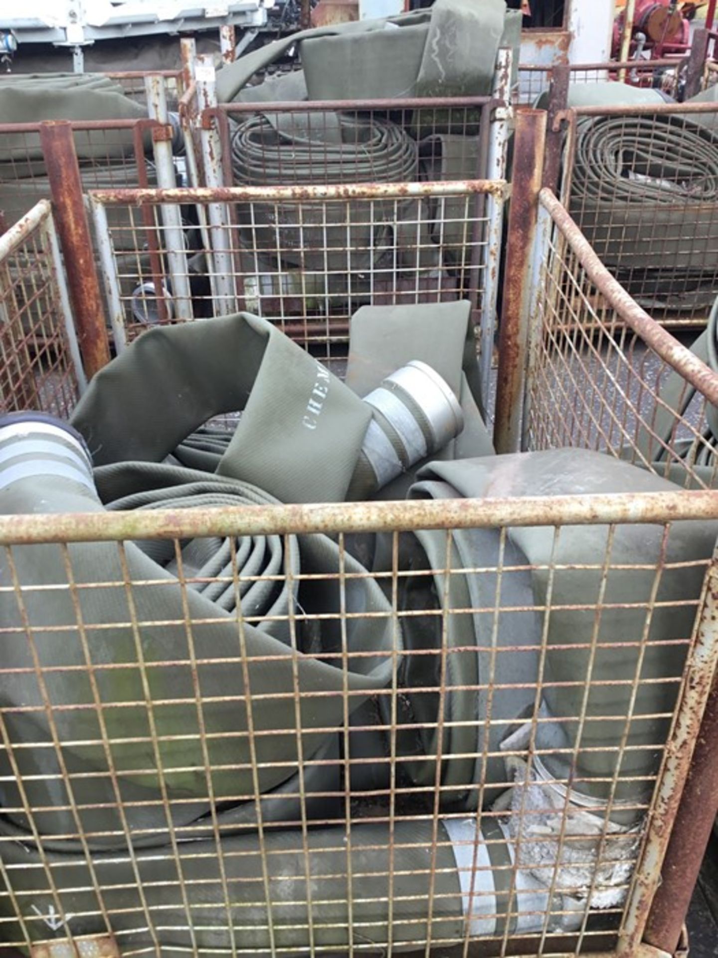 Cage containing 6 rolls of various 24-26ft length 6" layflat hose - Image 2 of 4